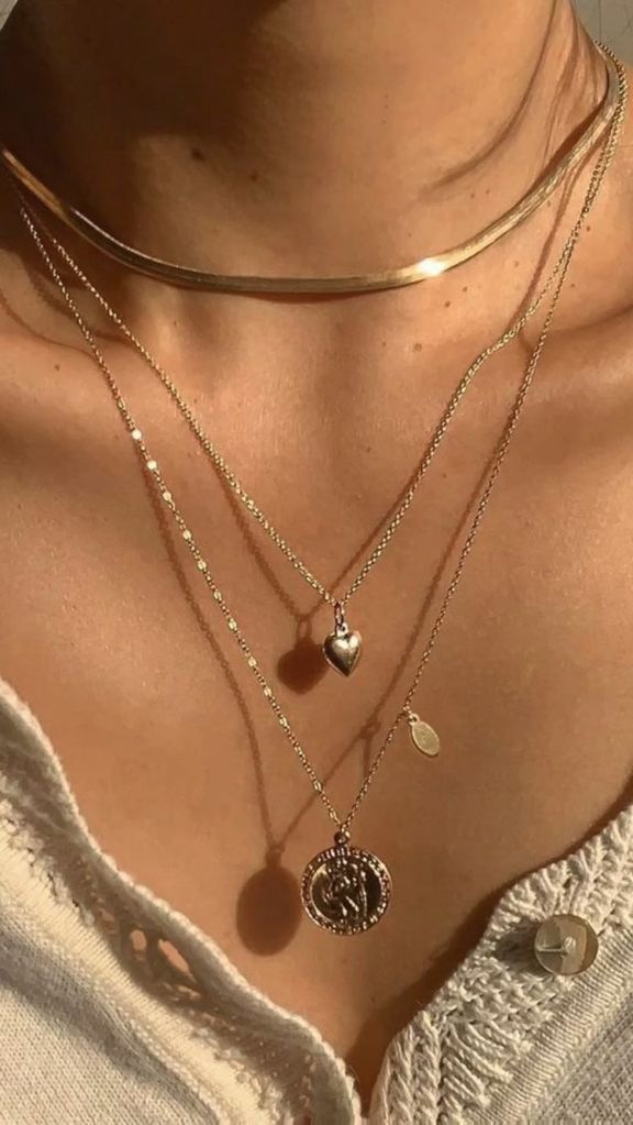 "Gold-plated necklace with a delicate pendant, perfect for adding elegance to any outfit."